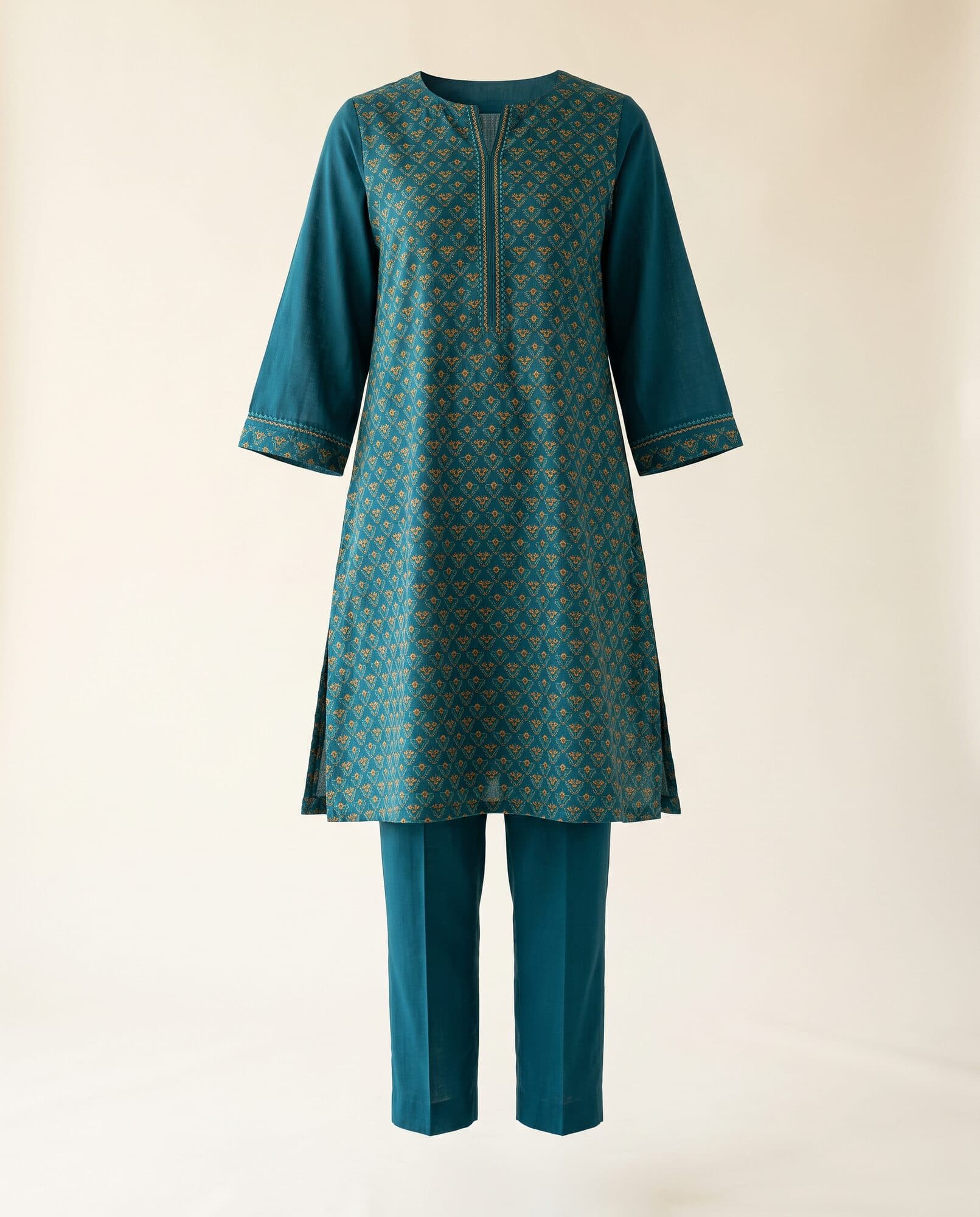 Teal printed pret 2 piece kurta and trouser on invisible mannequin